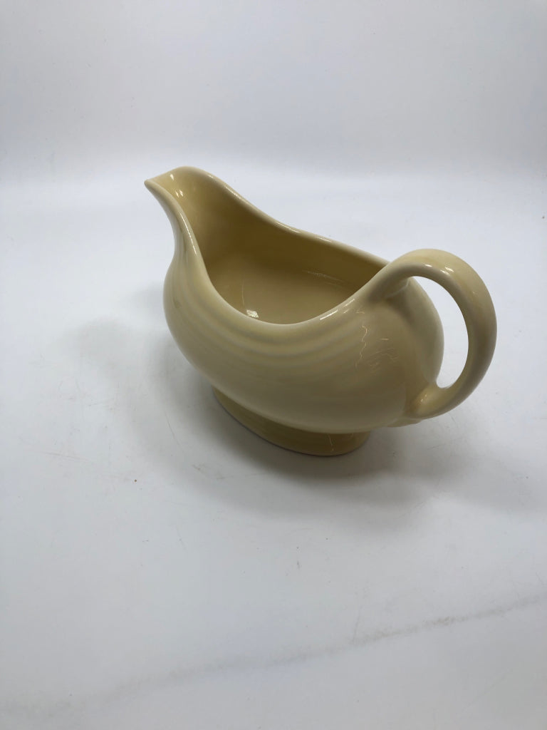 FIESTAWARE CREAM COLORED GRAVY BOAT.