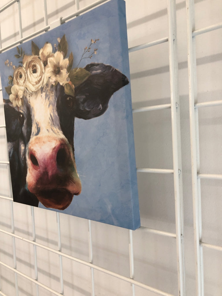 COW W/FLOWERS CANVAS.
