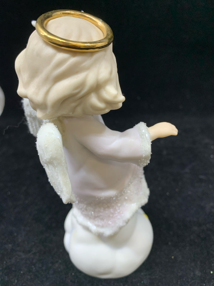 WHITE ANGEL GIRL HOLDING DOVE.