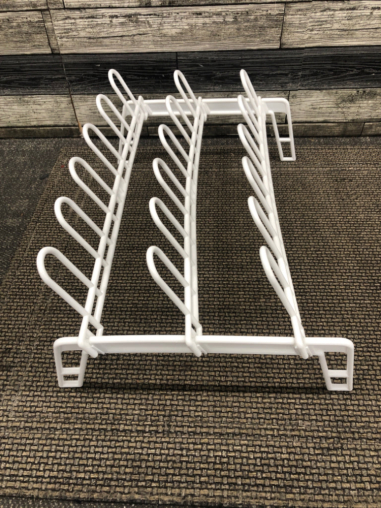 WHITE PLASTIC STANDING SHOE RACK.