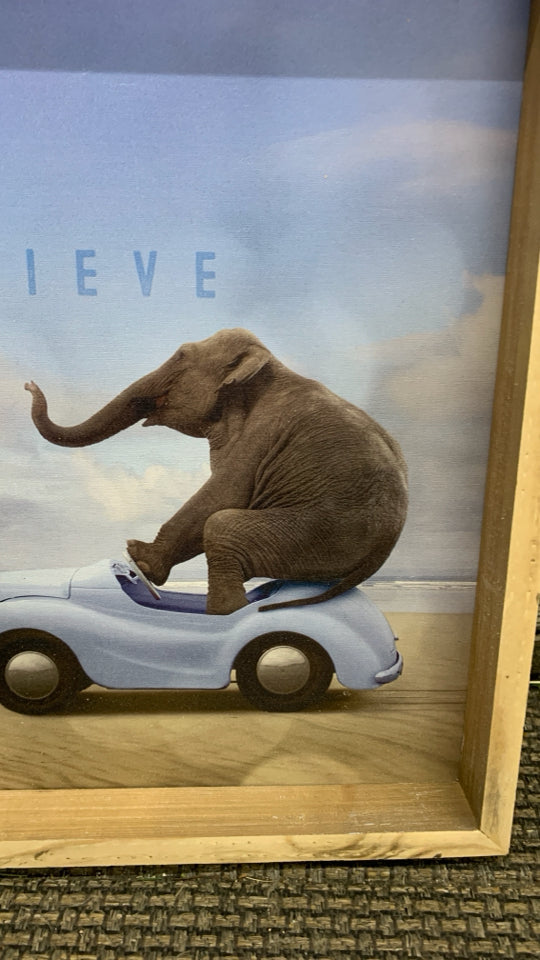 WOOD FRAME ELEPHANT RIDING ON CAR WALL HANGING.