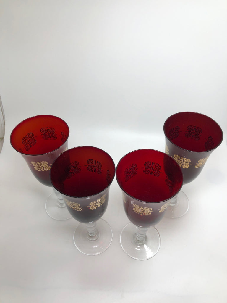 4 RUBY RED GOBLET WITH GOLD SWIRL DESIGN.