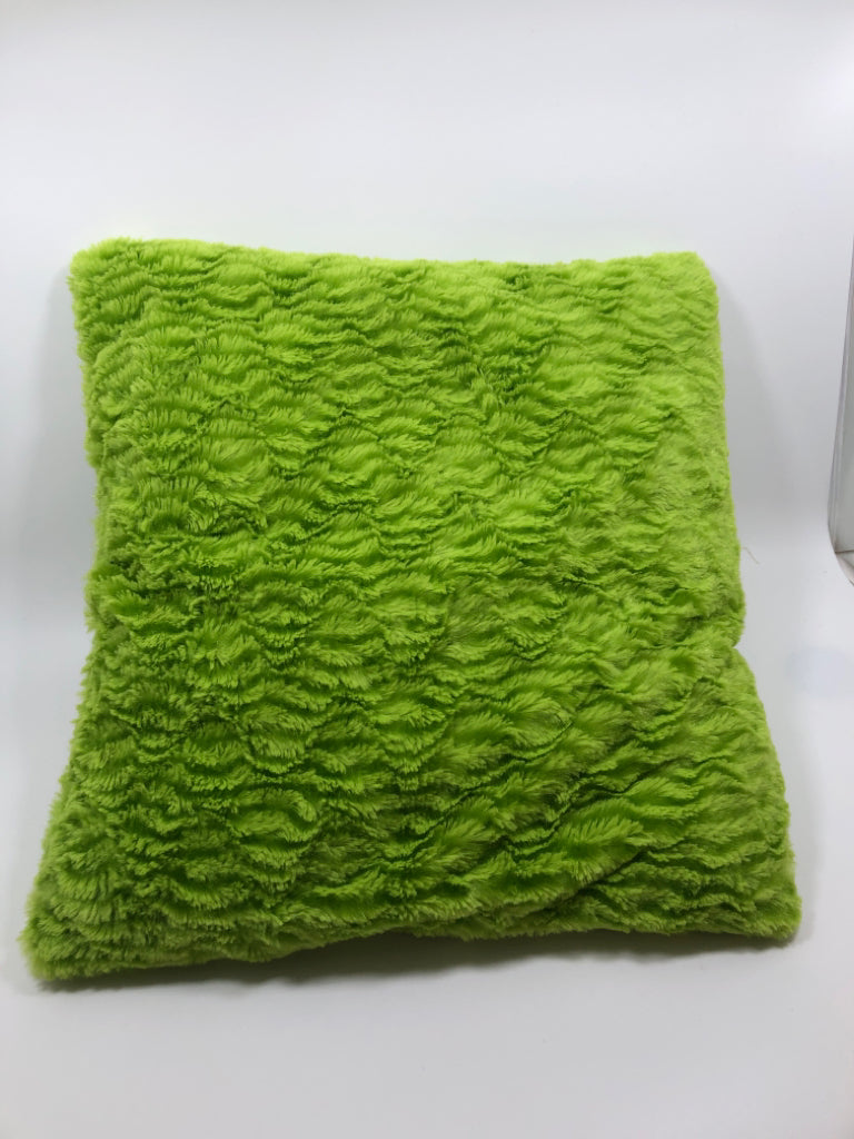 GREEN FUZZY THROW PILLOW.