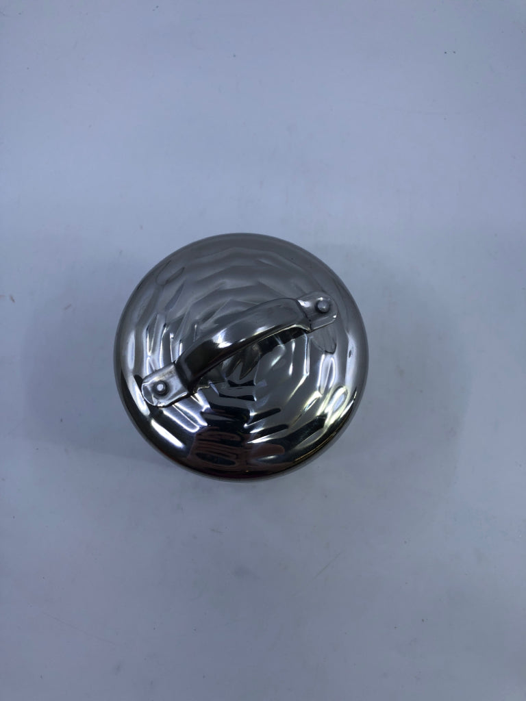 METAL DIMPLED CANISTER.