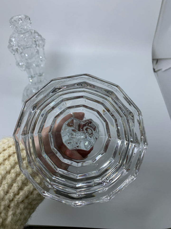 2 CRYSTAL NUTCRACKER TAPERED CANDLE HOLDERS.