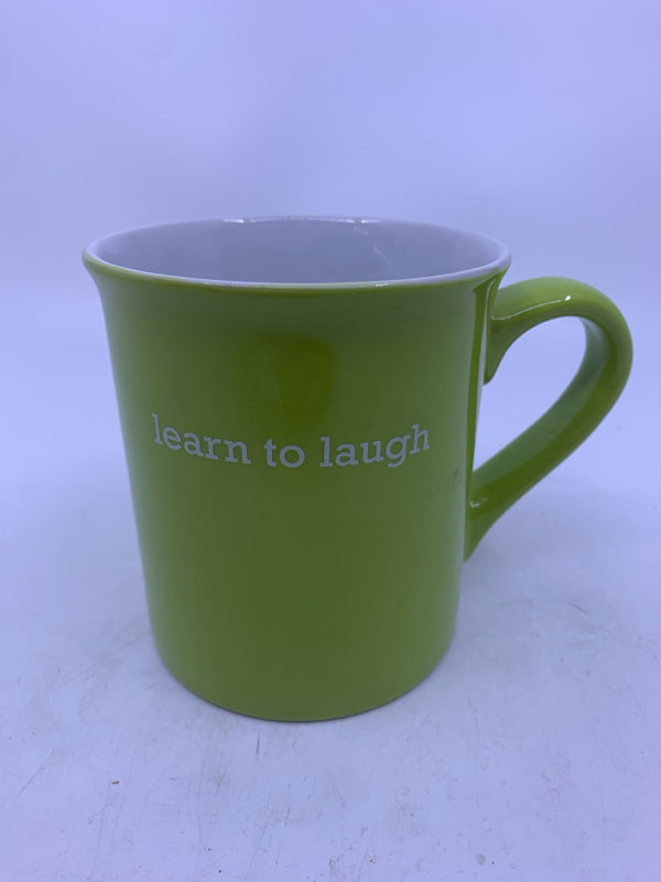 "LEARN TO LAUGH" GREEN MUG.
