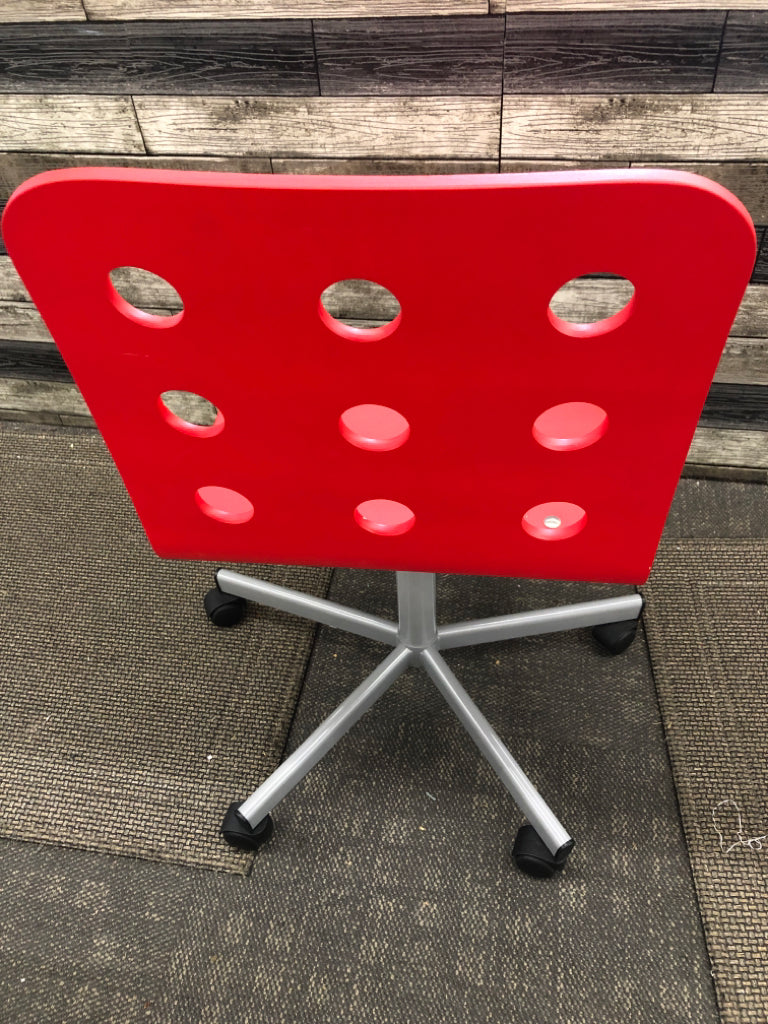 RED DESK CHAIR W WHEELS.