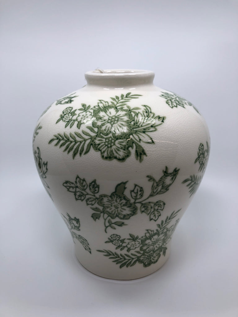 GREEN FLORAL CERAMIC VASE.