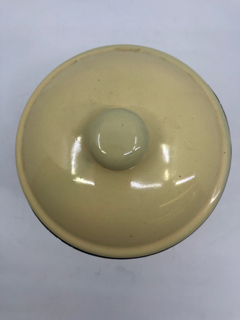 YELLOW METAL DECORATIVE CANISTER.