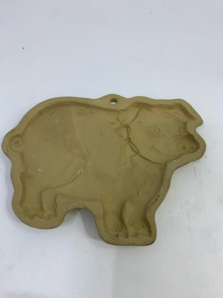 BROWN BAG CERAMIC PIG COOKIE MOLD.