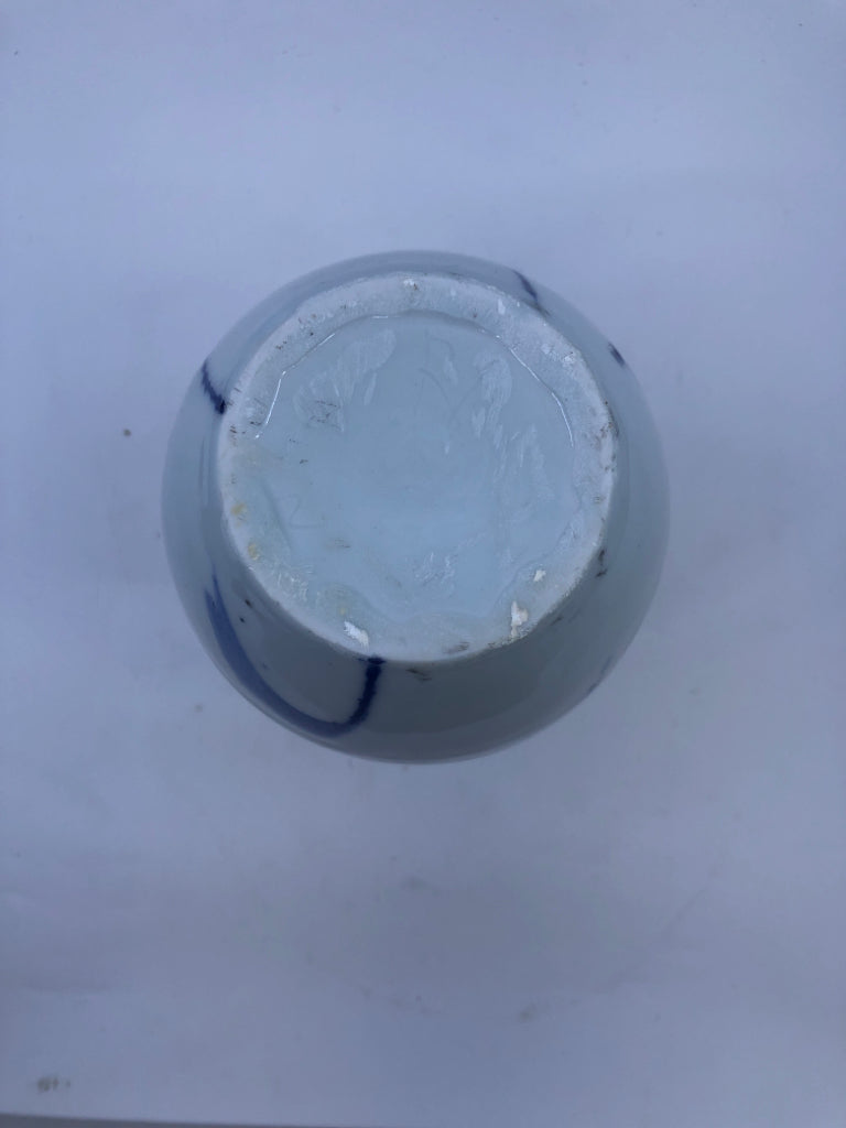 WHITE POTTERY VASE W/ BLUE DESIGNS.