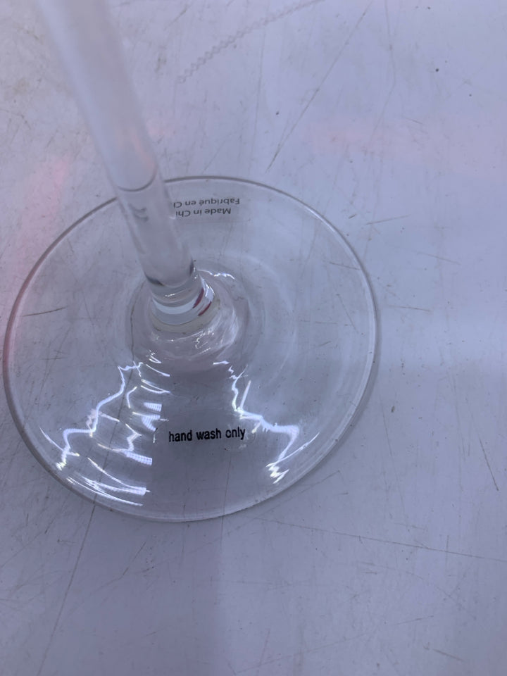 2 CLEAR GLASS STEM W/ RED TOP WINE GLASSES.