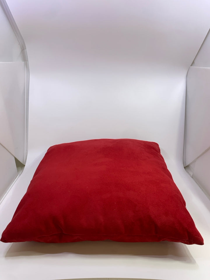 RED SUEDED PILLOW.