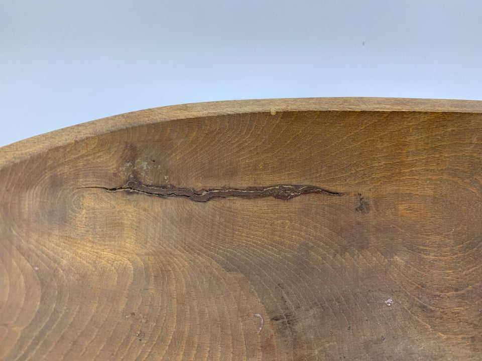 RUSTIC OVAL DARK WOOD CARVED BOWL.