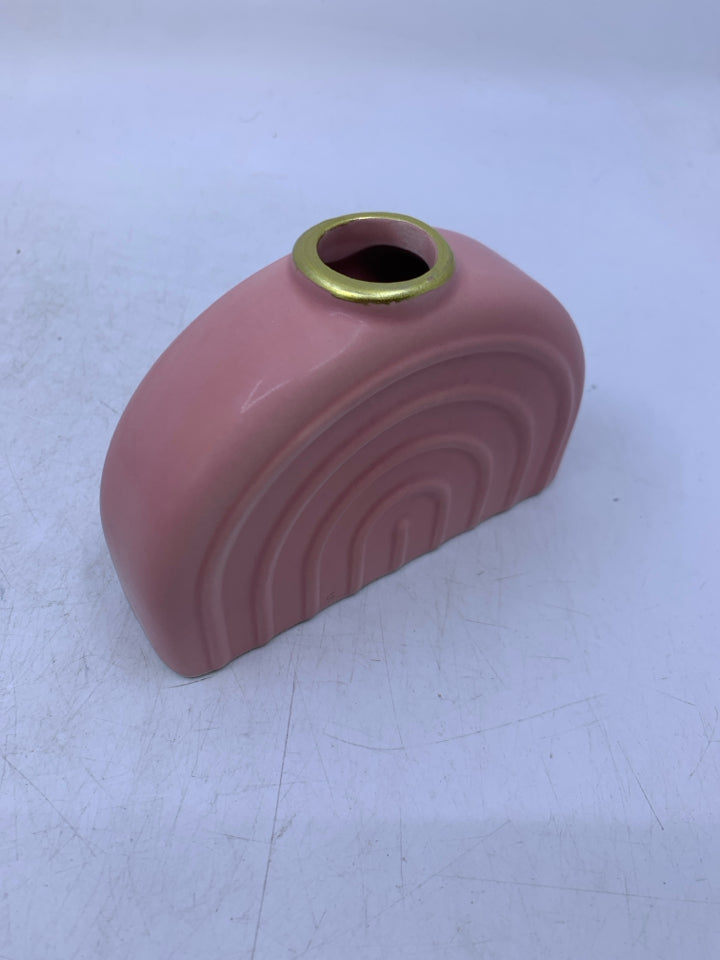 PINK CERAMIC RAINBOW SHAPED VASE.