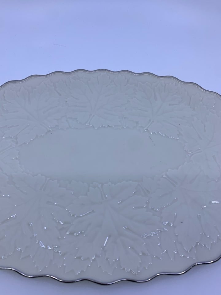 OVAL SERVING DISH W/ SILVER RIM-EMBOSSED LEAVES.