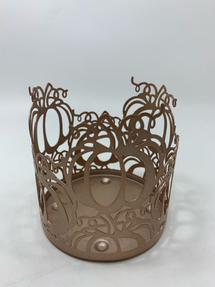 PINK METAL PUMPKIN CANDLE SLEEVE.