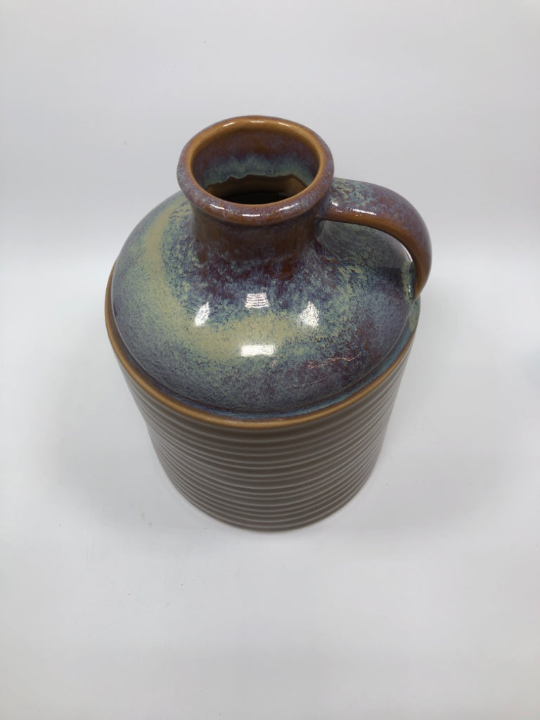 PURPLE GLAZED JUG.