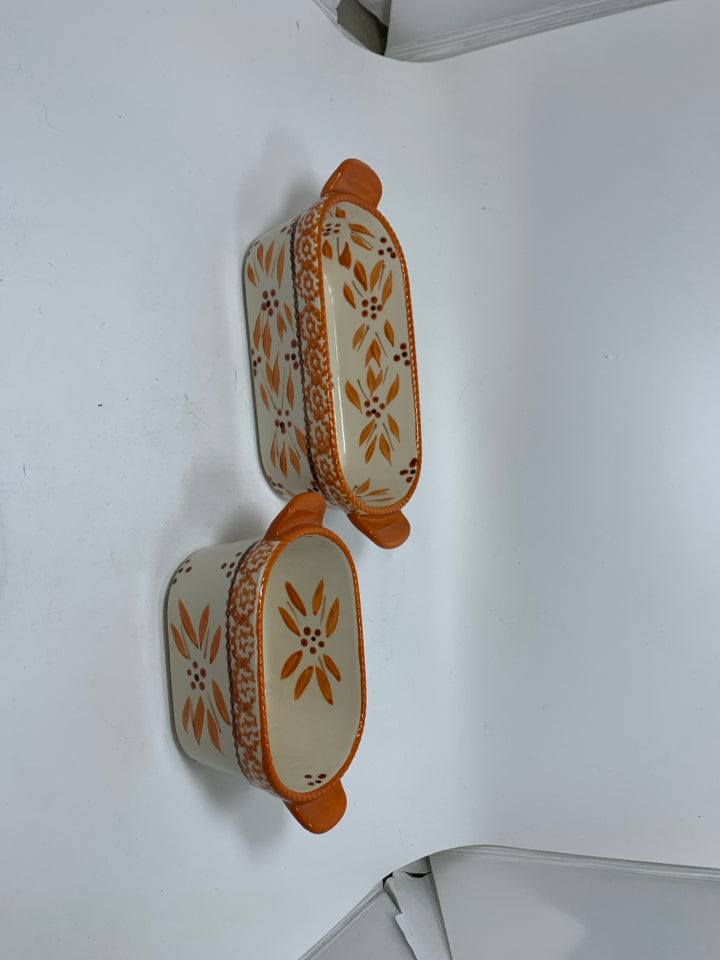 2 SMALL OVAL OLD WORLD BAKING DISHES.