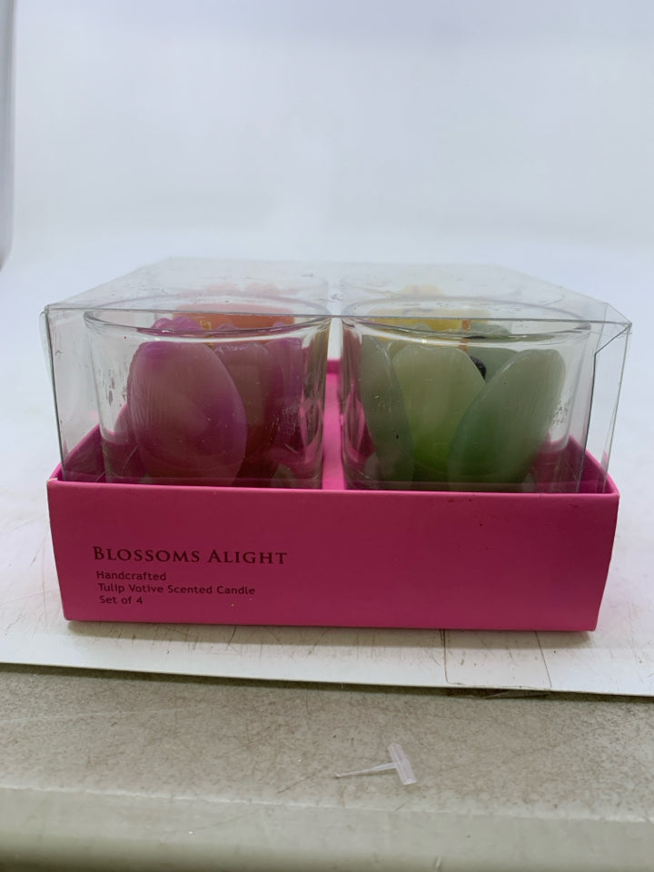 NIP 4 TEA LIGHT CANDLES W/ FLOWER SHAPED WAX.