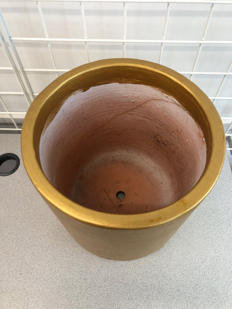 LARGE GOLD TERRA COTTA PLANTER.