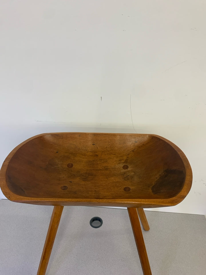 FOOTED WOODEN DOUGH BOWL TABLE.