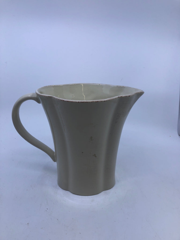 CERAMIC OVAL PITCHER.