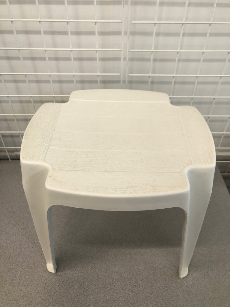 WHITE PLASTIC TEXTURED STOOL.
