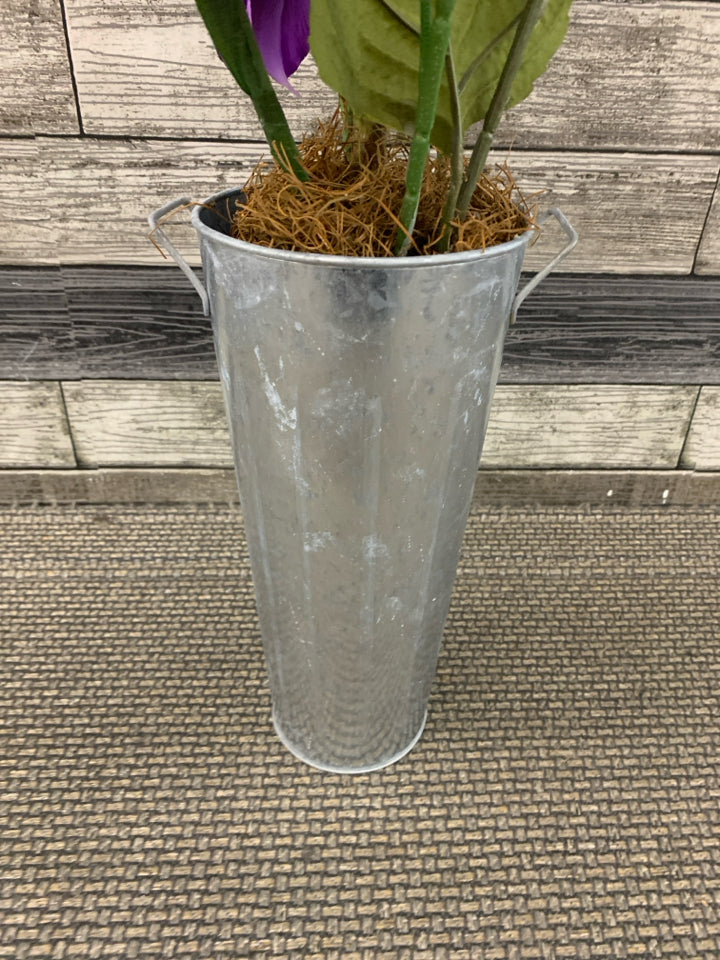 FAUX PURPLE FLORAL IN METAL PLANTER.