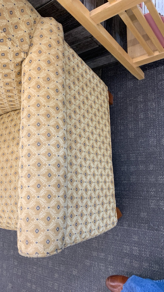 GOLD WITH BLUE ACCENTS ARM CHAIR.