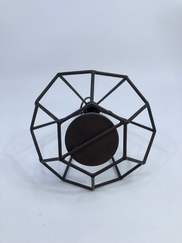 BROWN CAGE PRISM SHAPE TEA LIGHT HOLDER.