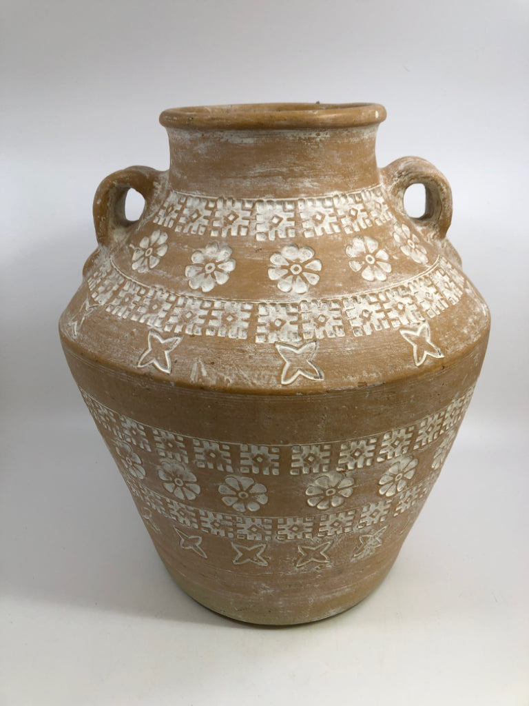 CLAY JUG SHAPED VASE W/WHITE CARVED FLOWERS.