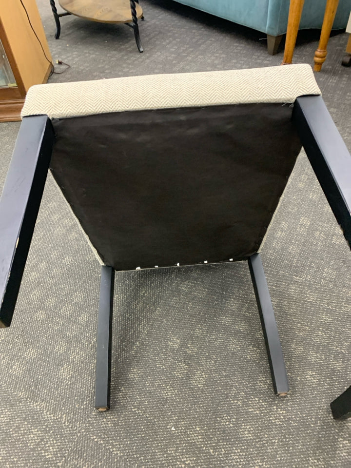 2 CREAM ACCENT CHAIRS W/ BLACK LEGS.