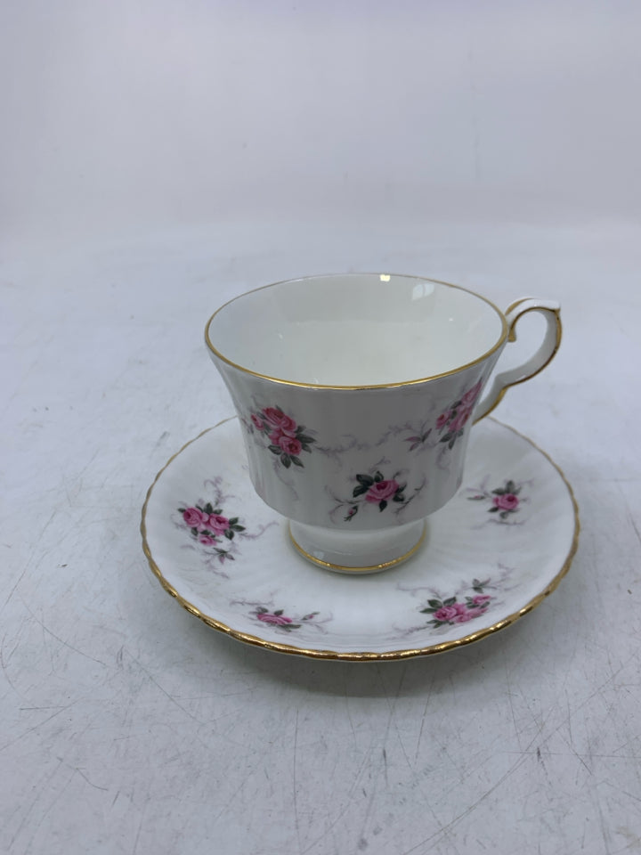 WHITE W/ PINK ROSES GOLD RIM.