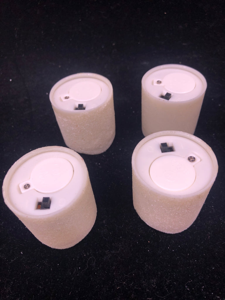 4 GLITTER BATTERY VOTIVES.