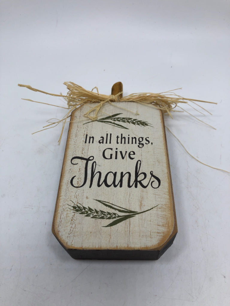 PRIMITIVE IN ALL THINGS BOTTLE SHAPED WOOD BLOCK SIGN.