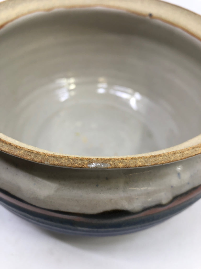 ROUND BLUE AND RED POTTERY CANISTER.