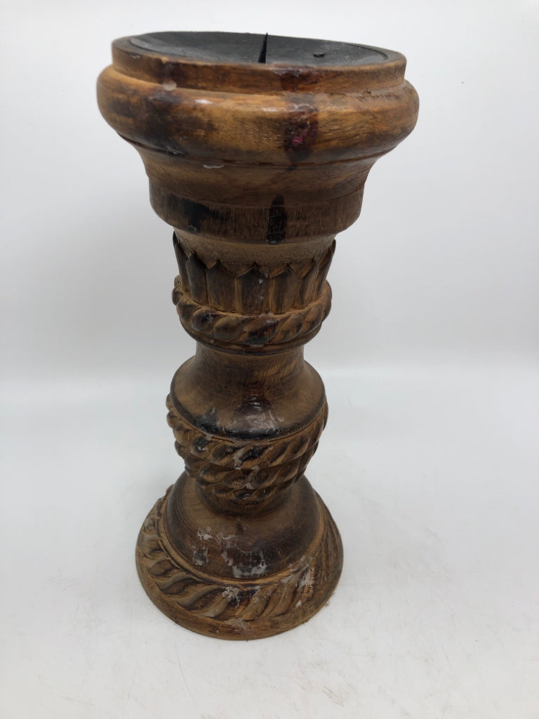 2 WOOD CARVED CANDLE HOLDERS W/BURNT FINISH.