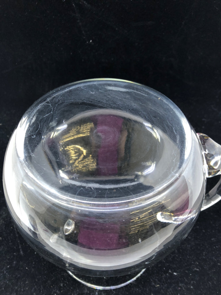 CLEAR GLASS PITCHER WITH ICE LIP.
