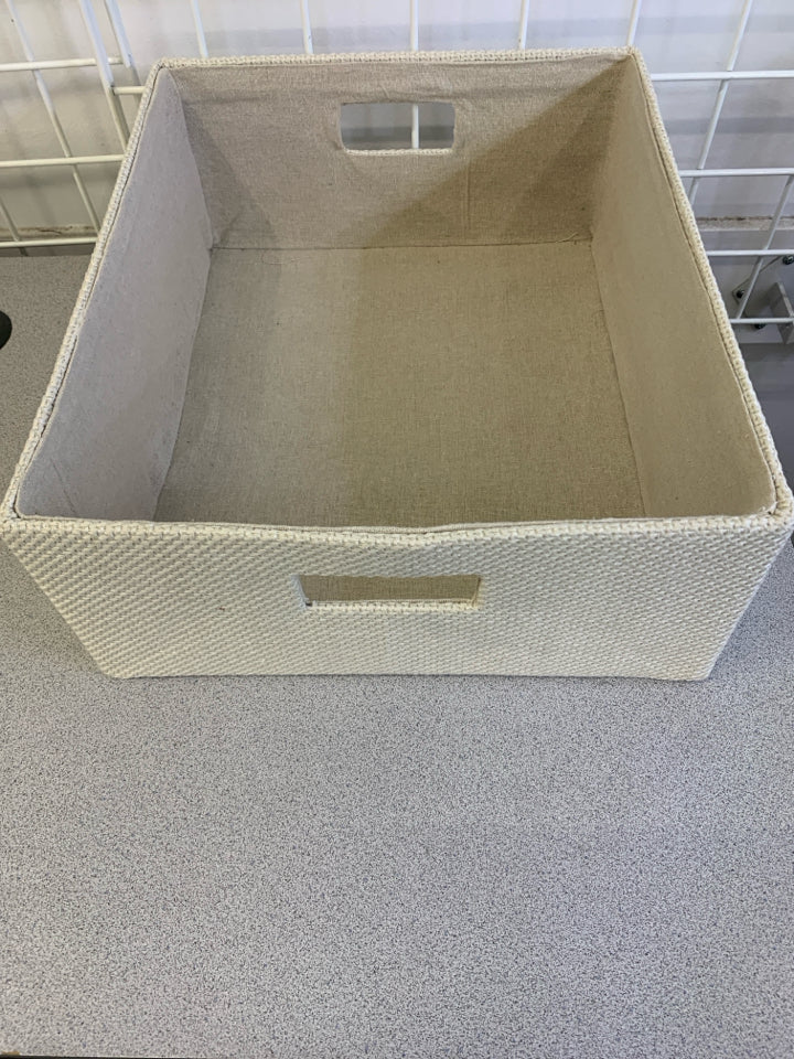 CREAM FABRIC STORAGE BIN.