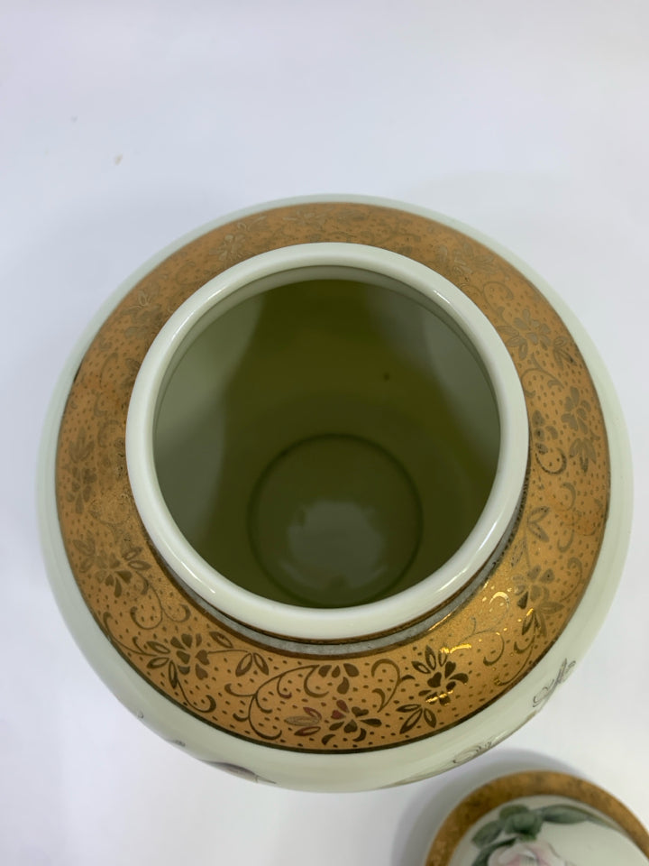 WHITE FLOWER PORCELAIN URN W/GOLD TRIM.