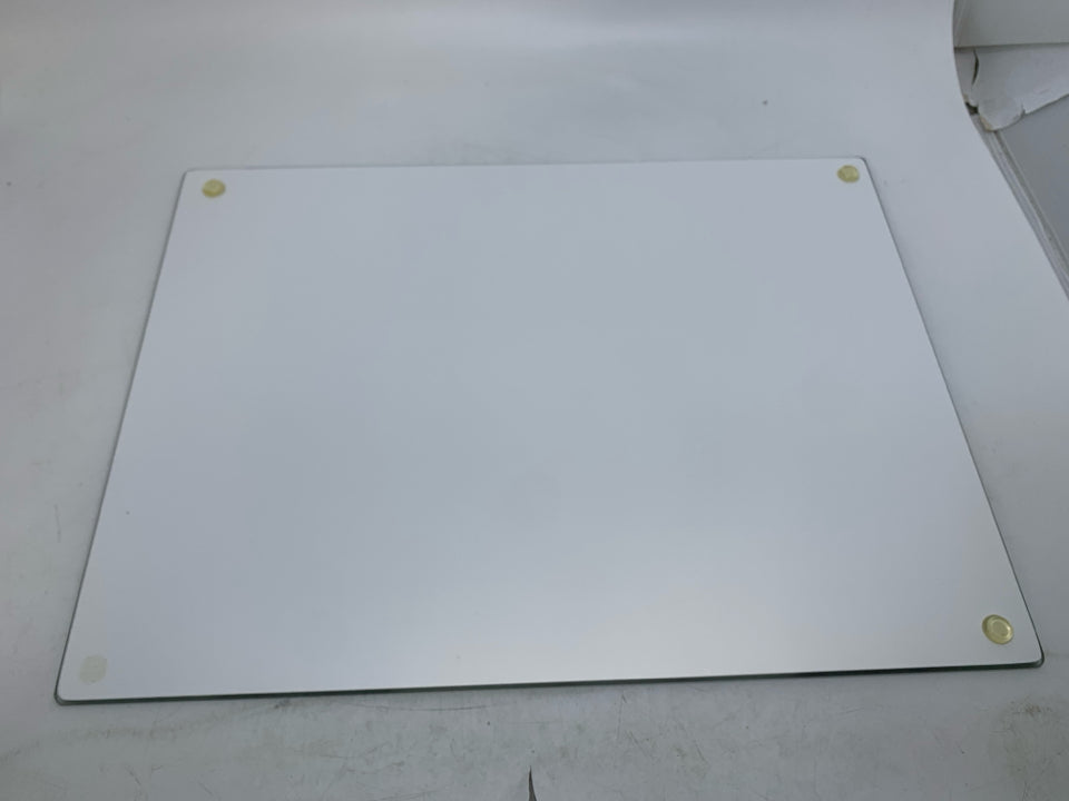 POLAR BEAR HOLDING CHRISTMAS TREE GLASS CUTTING BOARD.