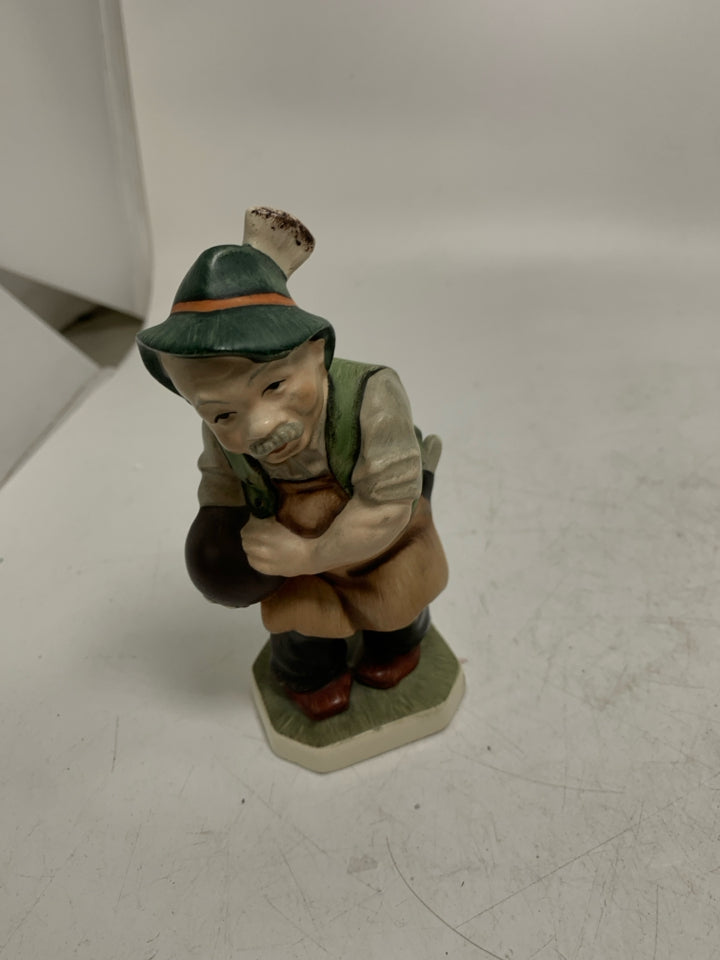 VTG FRIEDEL GERMAN MAN HOLDING BOWLING BALL.