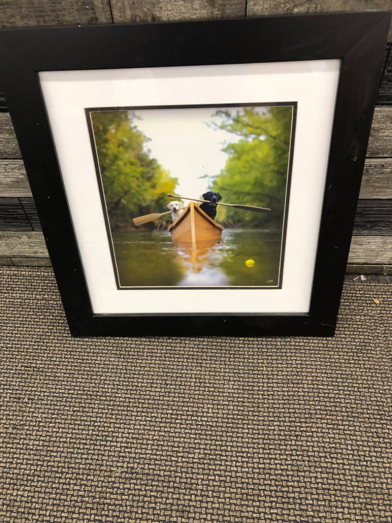 DOGS PADDLING IN BOAT IN BLACK FRAME WALL ART.