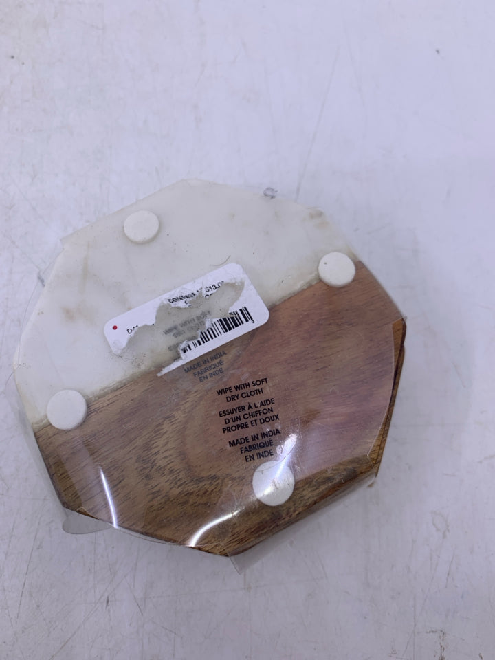 NIP 4 HEXAGON SHAPED COASTERS.