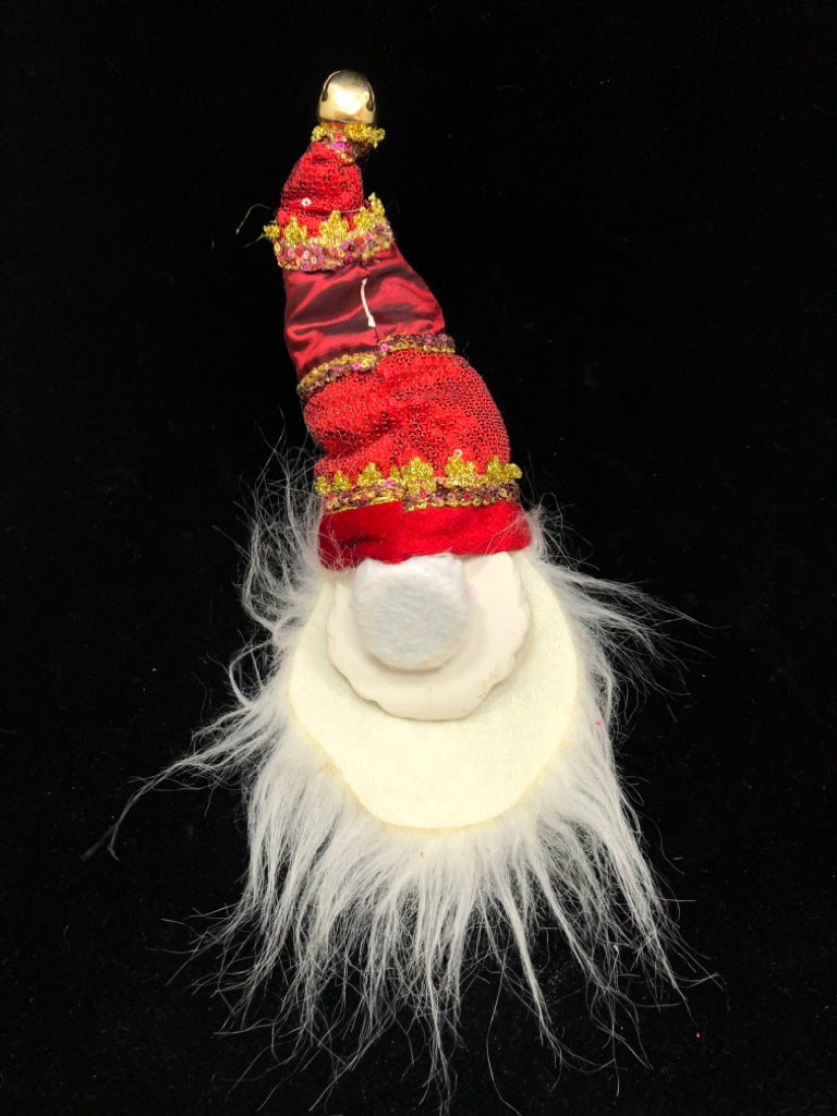 SANTA HEAD W/ LONG SEQUENCE HAT.