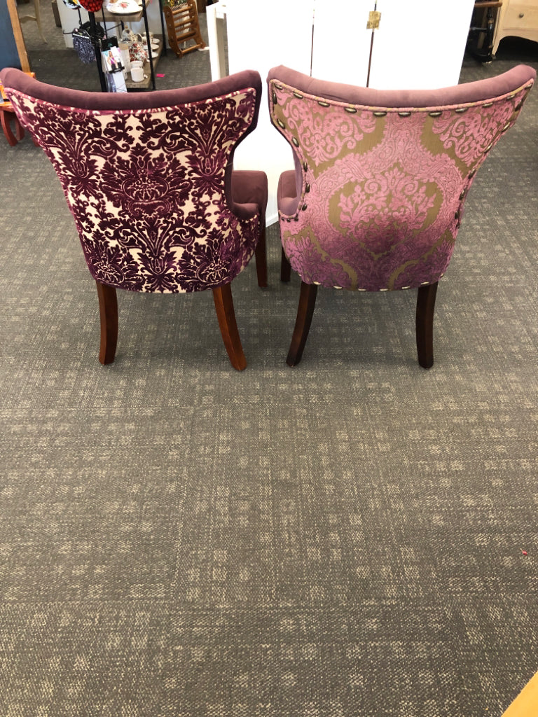 2 MAROON SUEDED CHAIRS W/PAISLEY DESIGN ON BACK & WOOD LEGS.