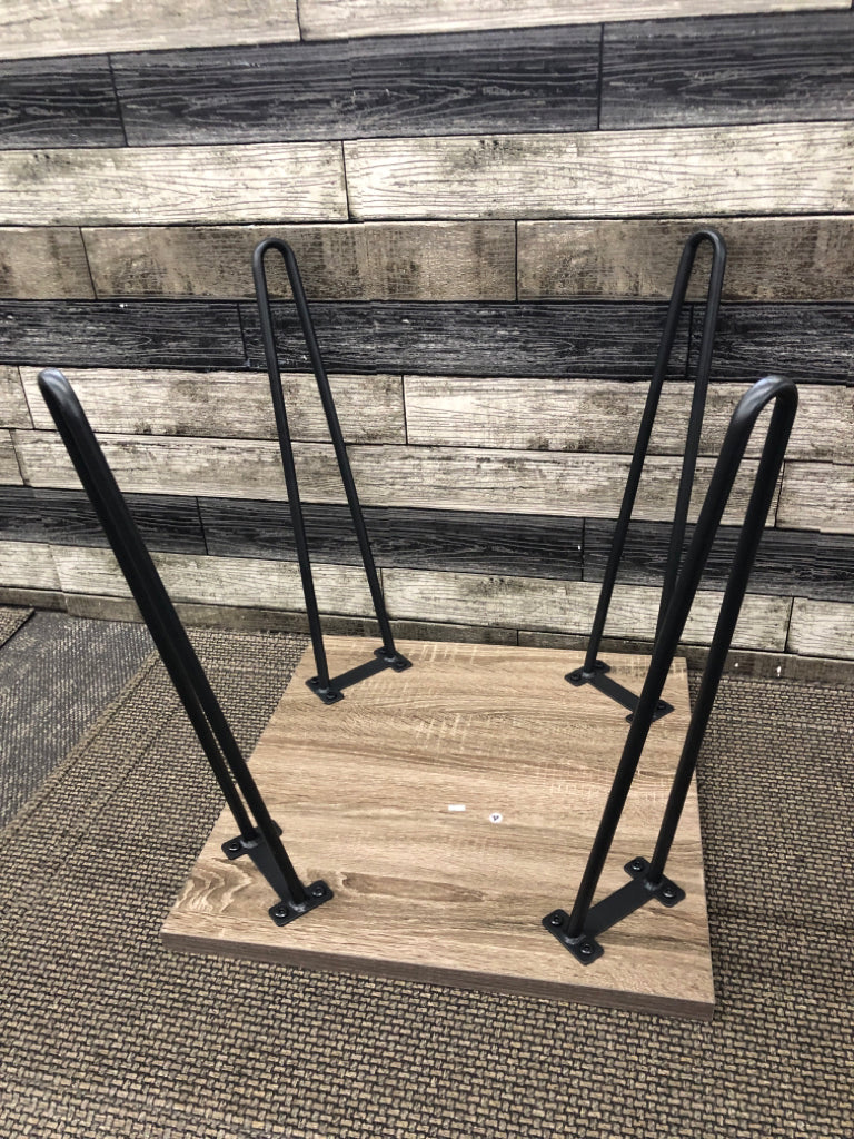 FAUX GREY WOOD SIDE TABLE W/ BLACK METAL PIN HAIR LEGS.