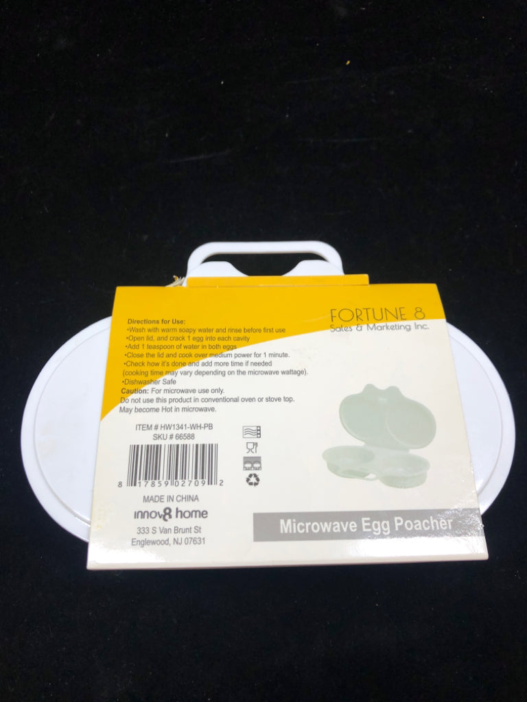 NIB MICROWAVE EGG POACHER.