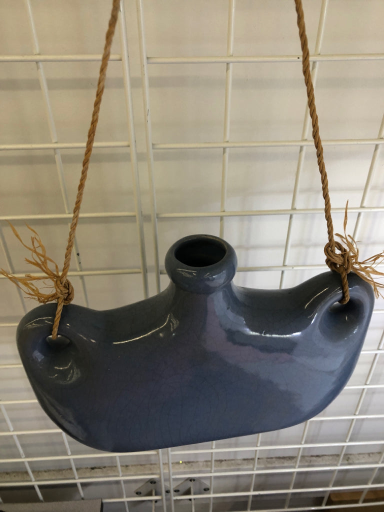 HANGING BLUE CRACKLE GLAZE POTTERY JUG.
